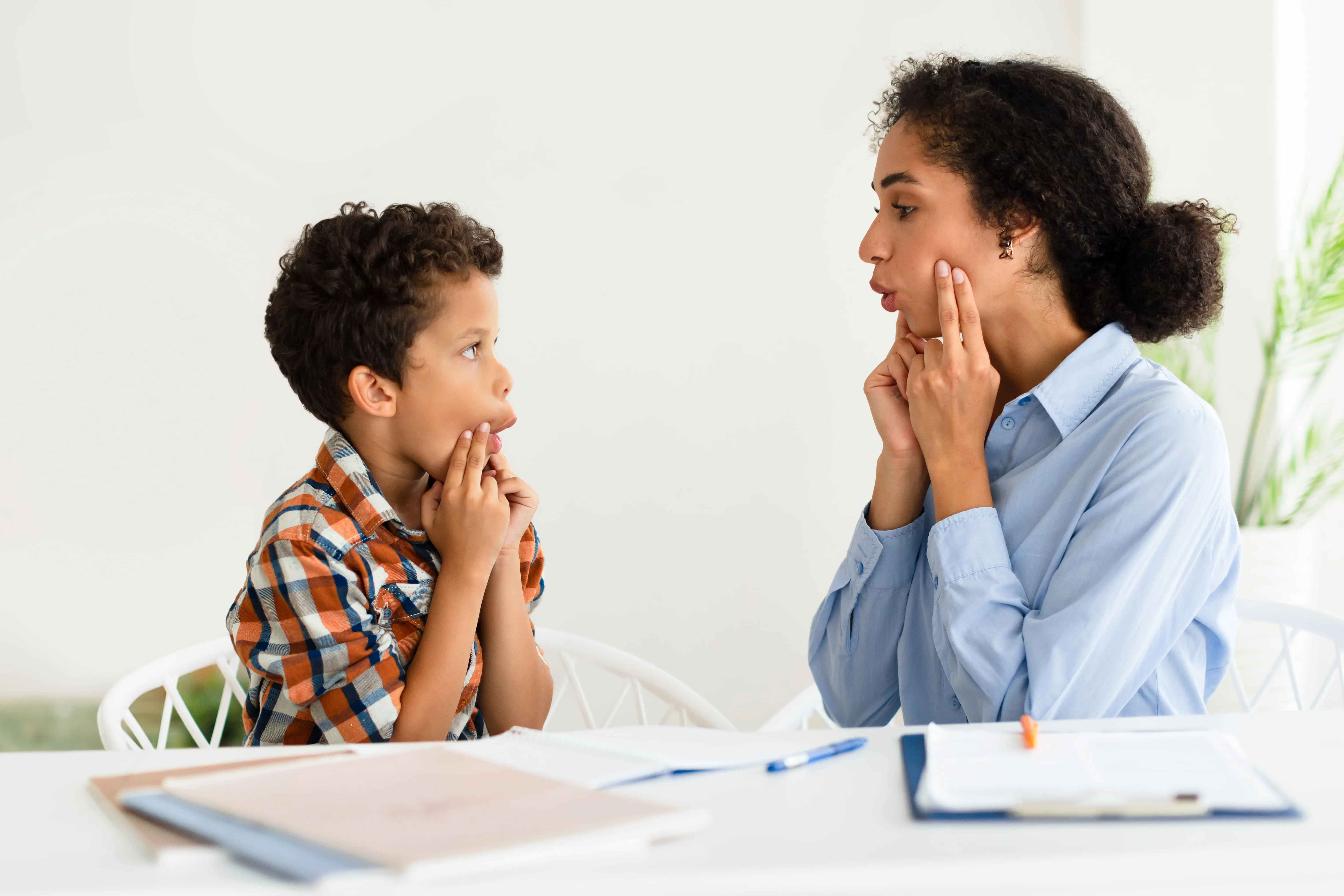 Therapist engaging in a Speech Therapy session with a child.